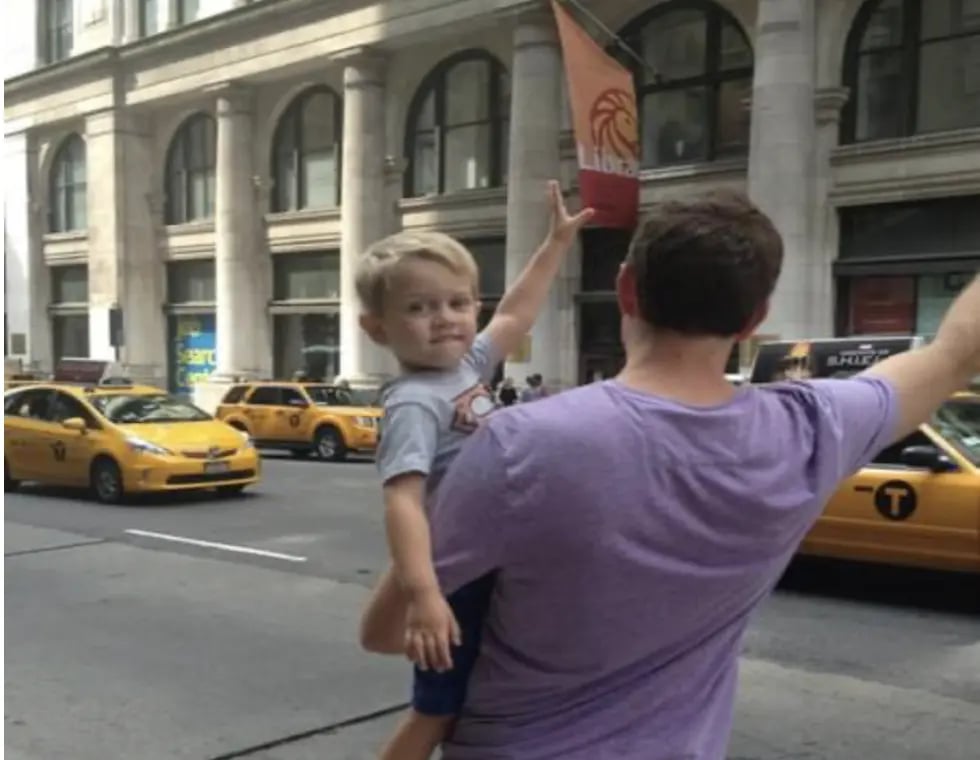 Me hailing a taxi with my Dad in New York