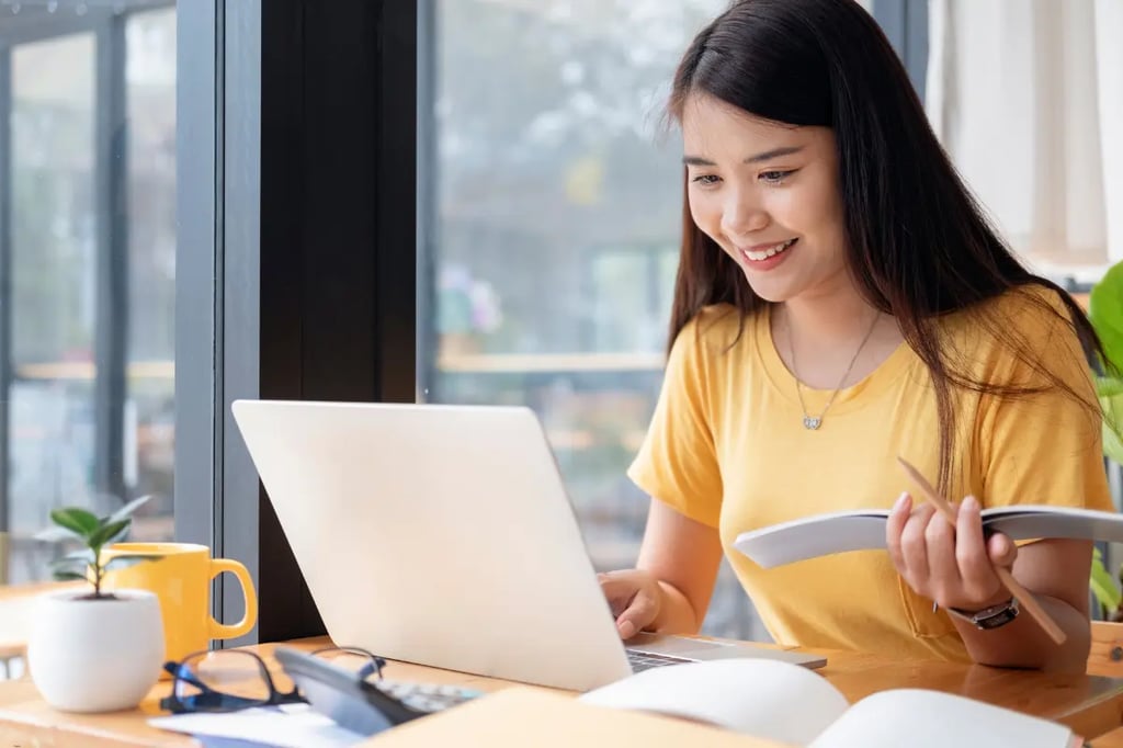 Student studying with a laptop, showcasing online private homeschool programs for personalized learning